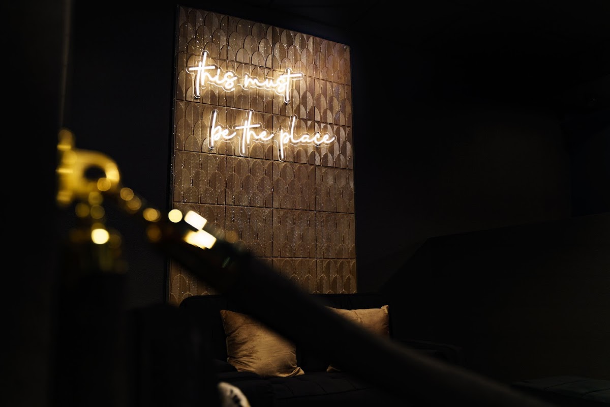 Opulence Nightclub Rogers logo